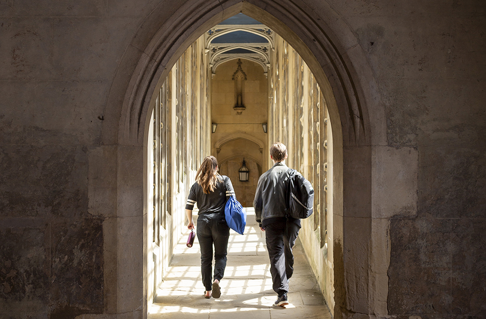 Two students cross the Bridge of Sighs