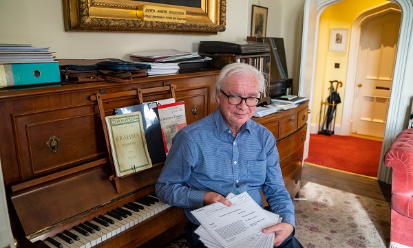 Professor Peter Johnstone with some of the letters he received in hospital from well-wishers 