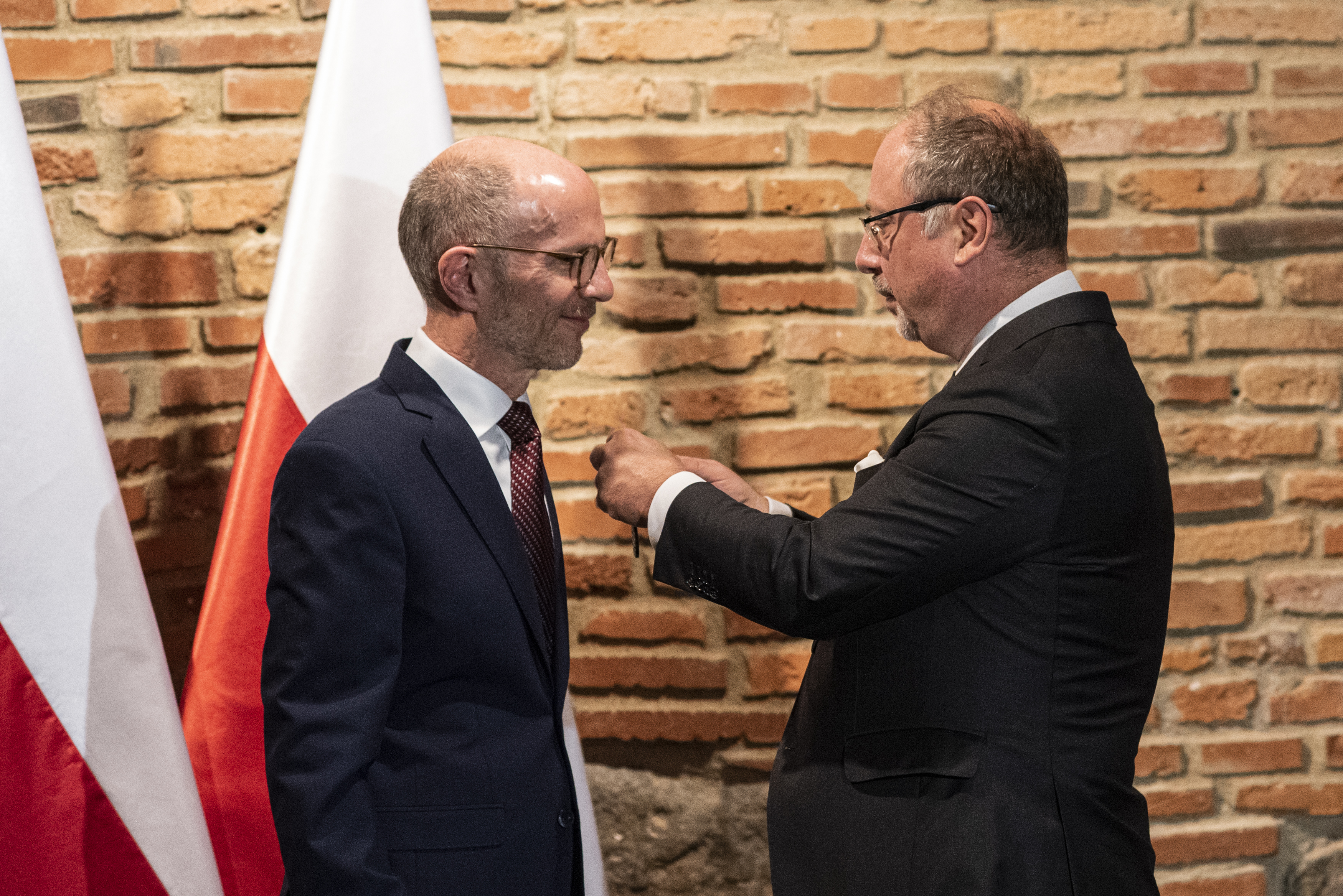 Professor Rink being presented with the Bene Merito medal of honour