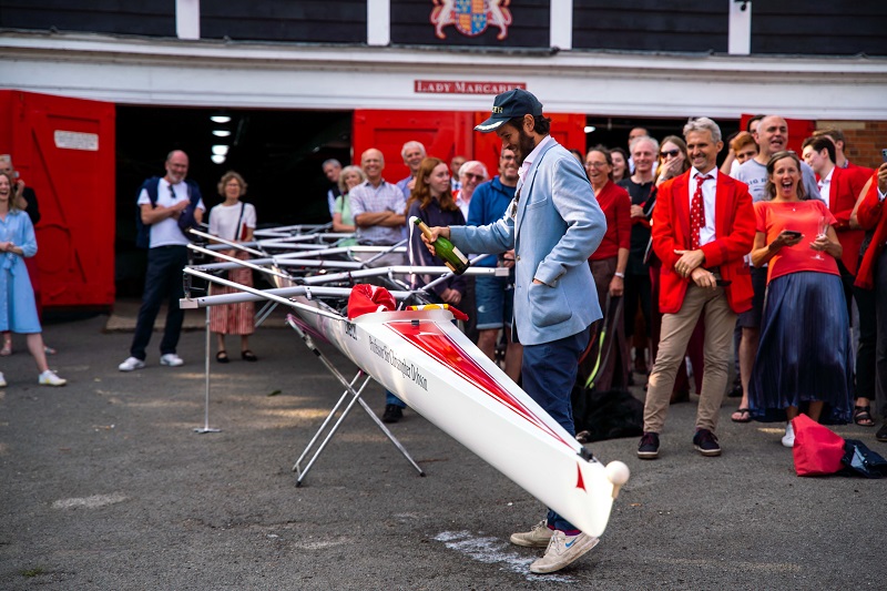 William Dobson christening the Professor Sir Christopher Dobson boat